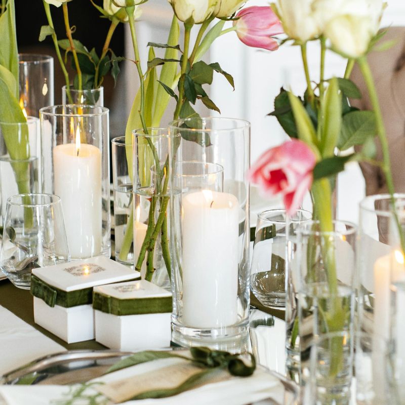 Pillar candles in glass cylinders