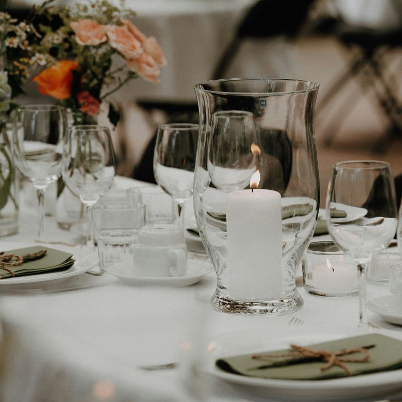 Pillar candle in hurricane glass